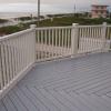 view from the top of the stairs. the herringbone pattern and boarder are nice. notice there are no fasterners showing. 